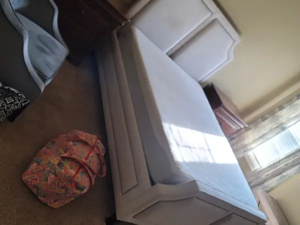 Bedroom furniture set carefully disassembled and padded for a move